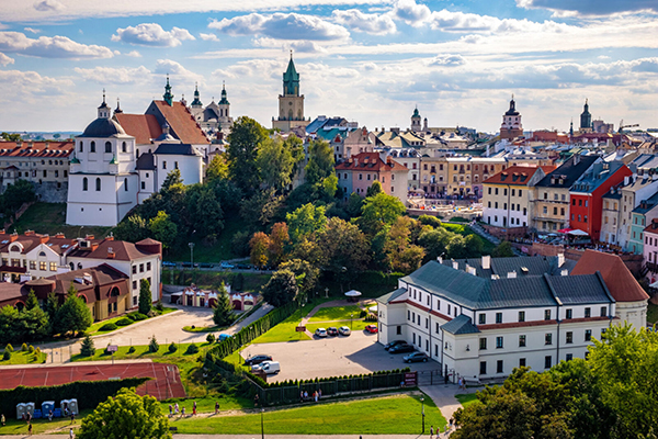 Lublin, Lubelskie / Poland - 2019/08/18: Panoramic view of city center with St. Stanislav Basilica and Trinitarian Tower in historic old town quarter